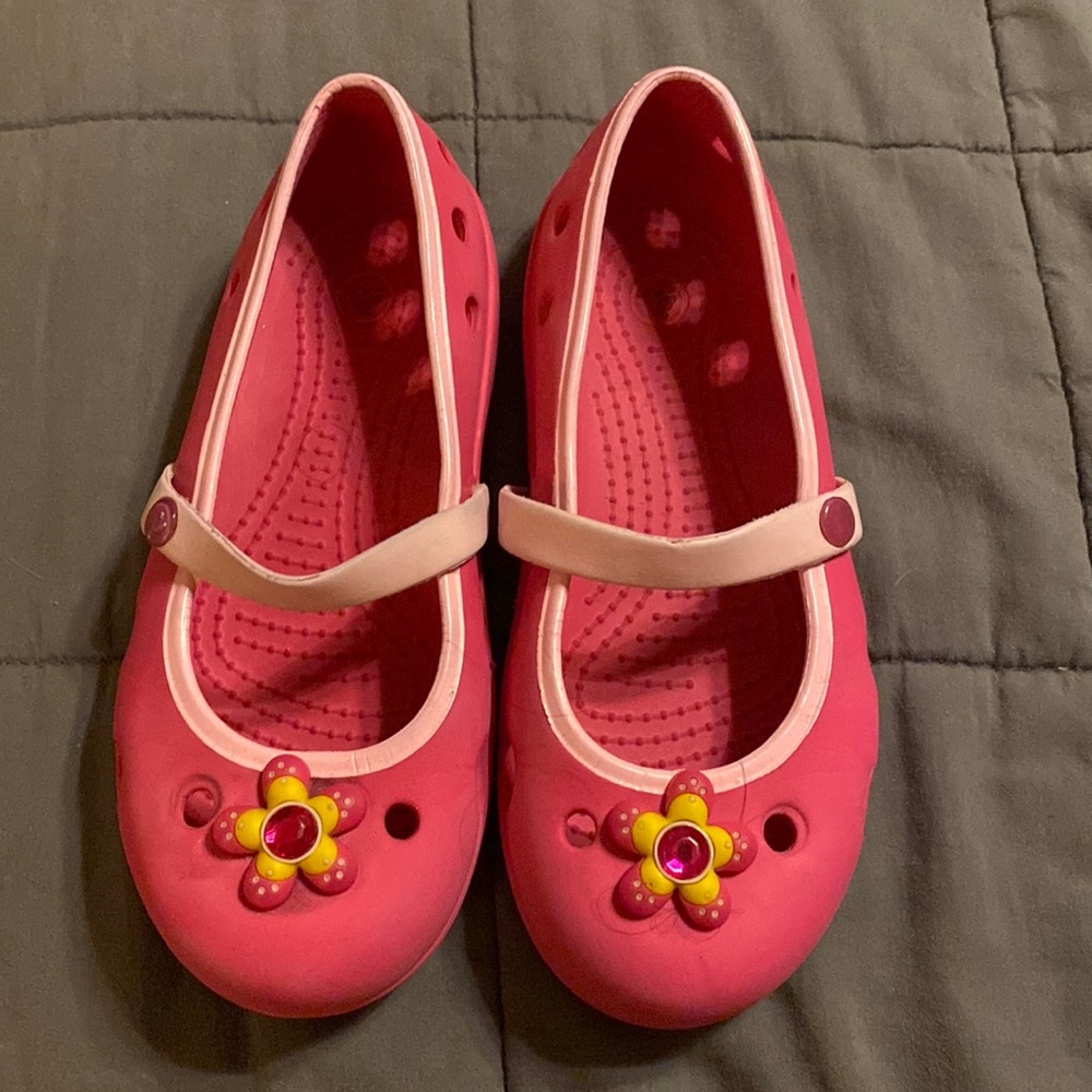 Crocs pink size c12 shoes with flower jibes